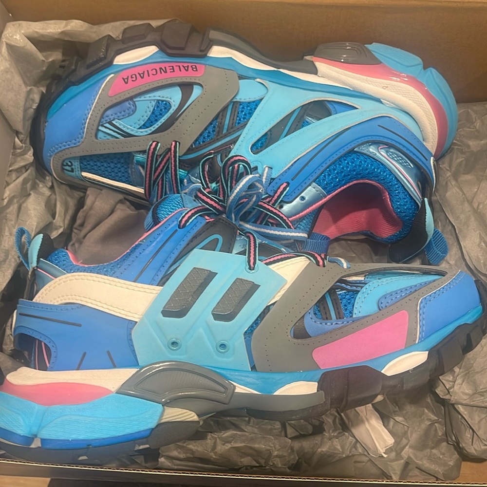 Blue track Balenciaga sneakers.